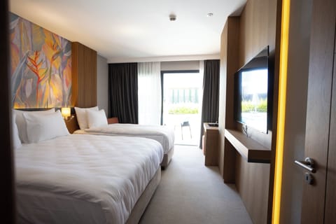 Standard Triple Room, Pool View | Premium bedding, Select Comfort beds, free minibar items, in-room safe