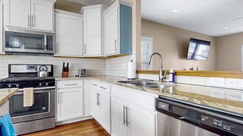Kitchen looking into living room: open concept floorplan 