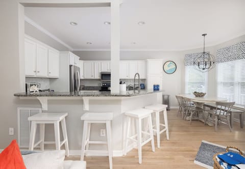 Plenty of seating at the breakfast bar.