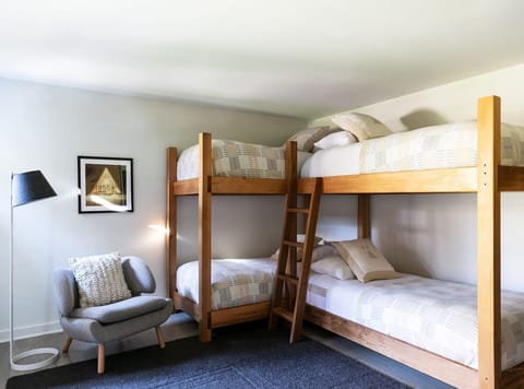 Settle in comfortably with sturdy bunks and cozy reading nook.
