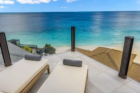 Stretch out on loungers and drift into seaside calm.