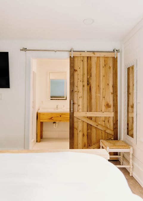 Shower, rainfall showerhead, towels, soap