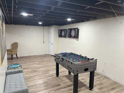 The finished basement is the ideal for games, movie nights, & more!​
