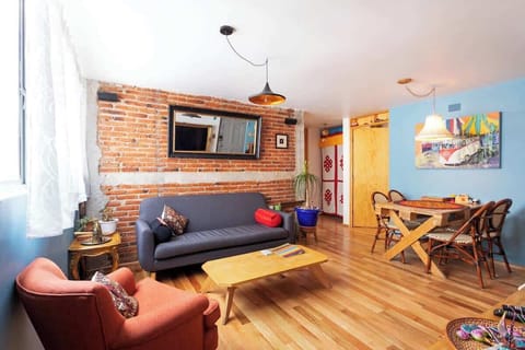 Cozy living room with TV and dining area