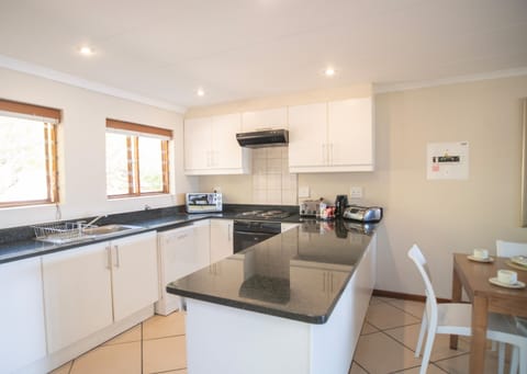 Coffee/tea maker, electric kettle, dining tables