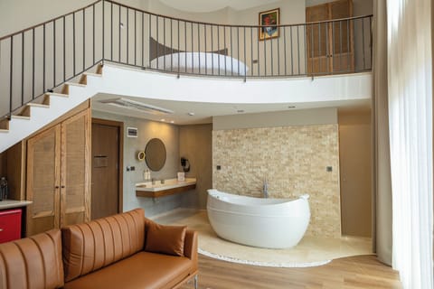 Loft Room  | Premium bedding, in-room safe, blackout drapes, WiFi (free)