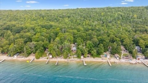 An aerial view of Bay & Birch, nestled along the crystal-clear shoreline of Colpoy’s Bay—peaceful, private, and surrounded by the beauty of the Niagara Escarpment.