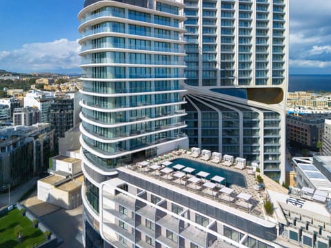 Mercury Suites Building with Rooftop Pool