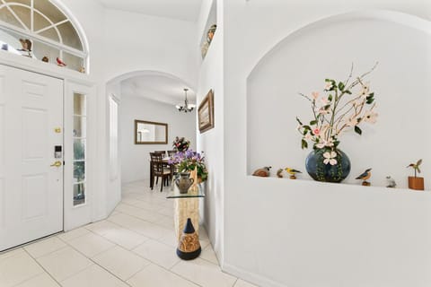 FOYER:  Entryway adjacent to Dining Room, as well as Hallway to Living Room and Twin-Bedded Rooms