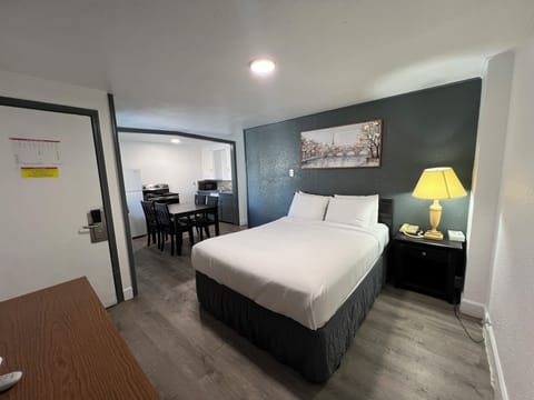 Family Room | Premium bedding, memory foam beds, desk, free WiFi