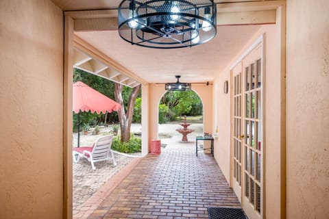 Formal entrance from the fountain into the breezeway to the formal front door