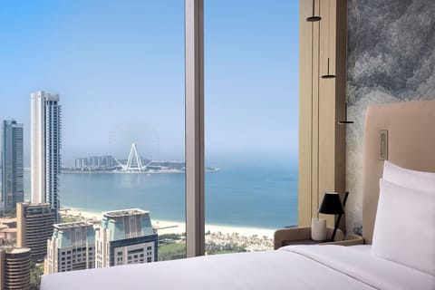 Premium bedding, down comforters, minibar, in-room safe