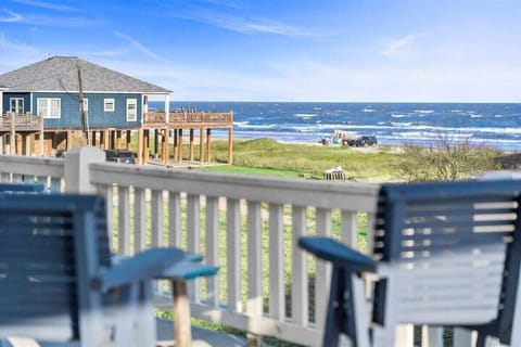 Scenic Gulf view from the deck showcasing nearby beach homes, coastal landscape, and relaxing waterfront scenery.