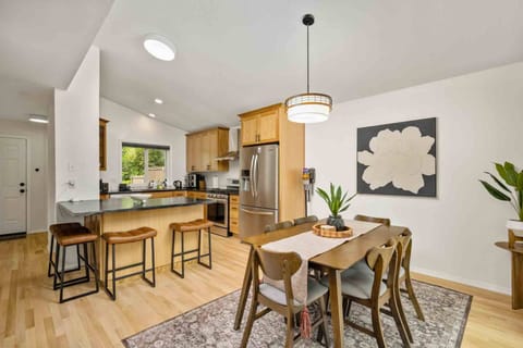 The kitchen and dining room are both spacious. This rental is a perfect place to enjoy a feast!