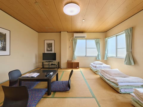 Japanese-style Triple Room, Smoking, Shared Bathroom (for 3 pax) | Down comforters, free WiFi, bed sheets