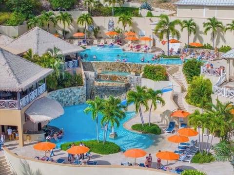Feel the vibrant resort energy around the terraced pools.