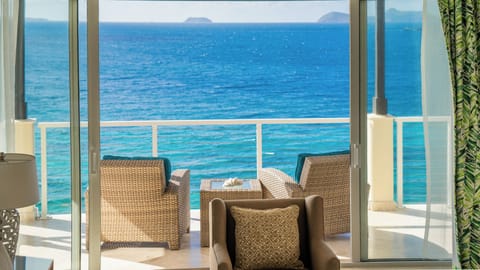 Step onto the balcony and breathe endless ocean views.