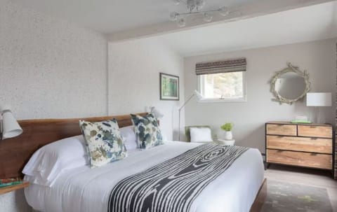 Stretch out and relax in a bright, peaceful bedroom.