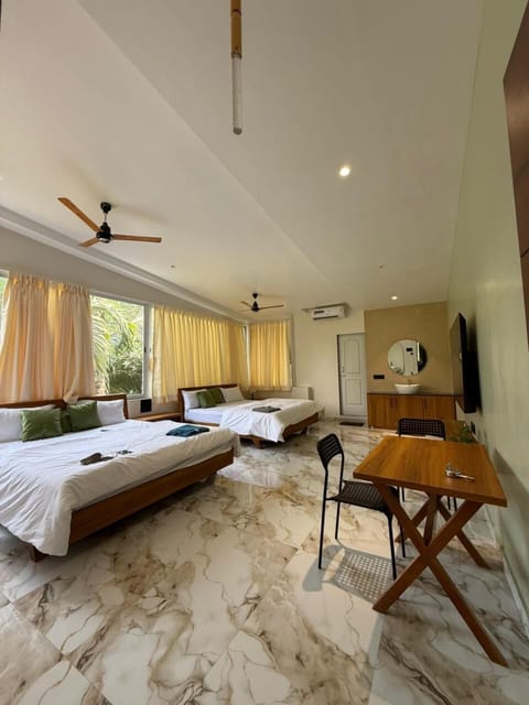 Deluxe Double Room, Garden View | Desk, free WiFi
