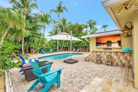 Enjoy vibrant outdoor living with poolside lounging, live sports entertainment, and endless relaxation.
