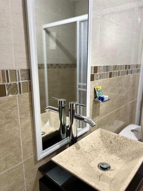 Standard Room, Garden View | Bathroom | Shower, towels, soap, shampoo