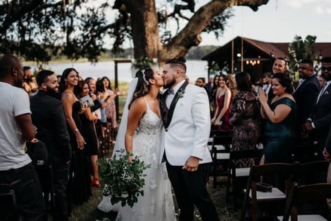 Say I do beneath the oaks with lake views, ideal for romantic outdoor weddings and receptions.