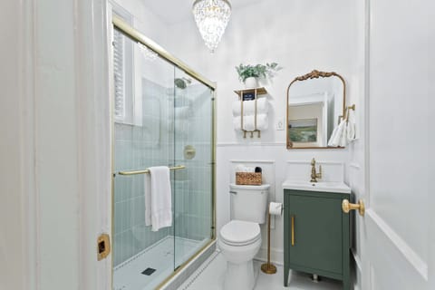 Clean and modern bathroom thoughtfully stocked with essentials for a comfortable stay