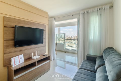 Basic Apartment | Living area | 32-inch Smart TV with digital channels