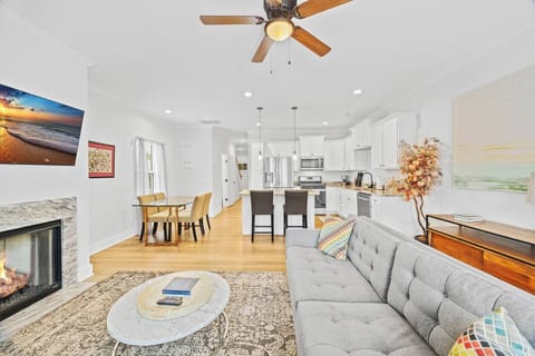 From the fireplace glow to the curated details, every inch of this space says: welcome home.