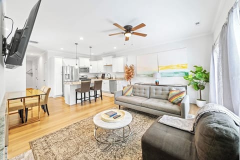 Stay connected with an open layout that brings everyone together — perfect for lounging, chatting, or watching the game.