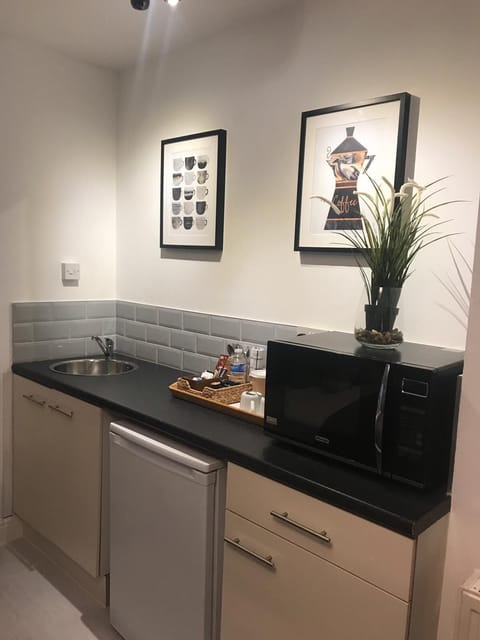 Desk, laptop workspace, blackout drapes, soundproofing