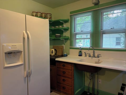 Kitchen sink and open shelving