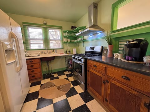 Kitchen with prep space and coffee bar