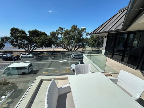 Directly opposite the beach close to Auckland city