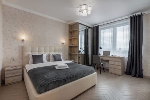 Comfort Apartment, Balcony, City View | Laptop workspace, blackout drapes, iron/ironing board, WiFi (free)