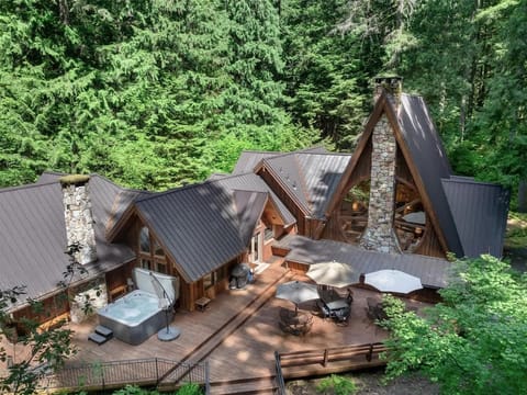 The cabin is complete with a hot tub and spacious deck.