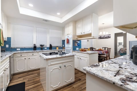 Very large kitchen area. Fully stocked with premium appliances and accessories. 