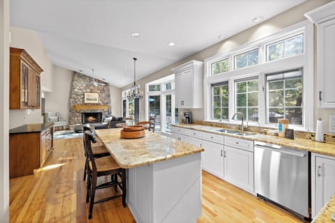 Bar seating and big laughs, this kitchen’s the heart of the home