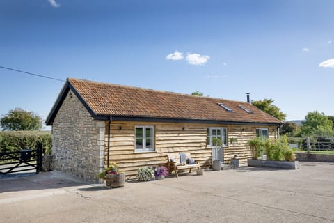 Welcome to Woodsmoke, a beautifully restored 200-year-old stone barn nestled on a charming working farm