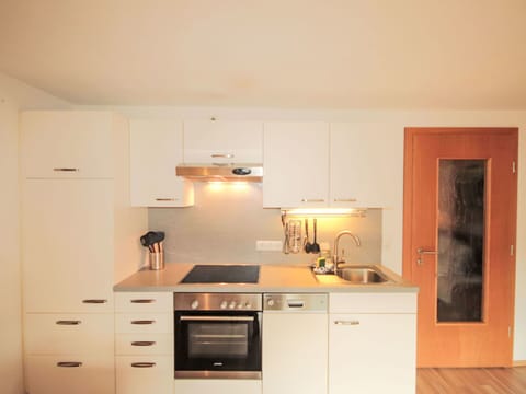 Furniture, Kitchen, Countertop, Cabinetry, Kitchen Appliance, Interior Design, Flooring, Wood, Major Appliance, Floor