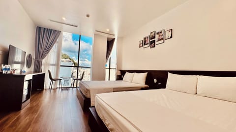 Family Room, City View | Desk, laptop workspace, soundproofing, free WiFi