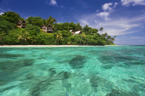 Private beach, white sand, beach umbrellas, beach towels