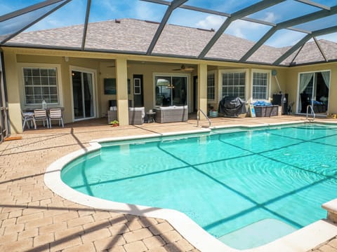 Heated pool with plenty of float toys, kids toys and more.