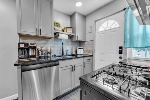 - Kitchen with sleek cabinets and stainless finishes   - Coffee station and cookware ready for guest use   - Bright and clean space for enjoyable meal prep  