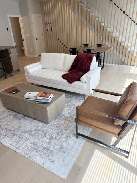 Living Room: Stylish seating and natural light! Creating a perfect spot