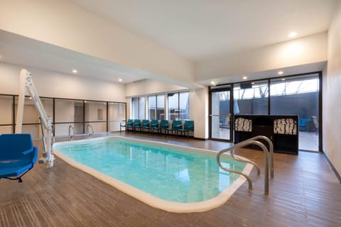 Indoor pool, open 9:00 AM to 10:00 PM, pool umbrellas, sun loungers