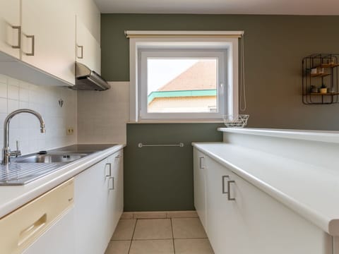 Kitchen, Countertop, Flooring, Wood, Interior Design, Plumbing Fixture, Ceiling, Cabinetry, Kitchen Sink, Floor