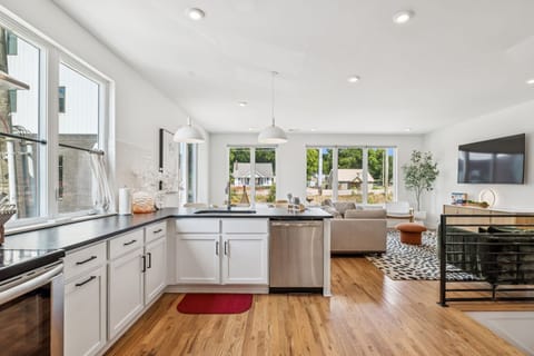 Kitchen: Start your day with coffee and sunshine in this inviting kitchen. A perfect space to gather and create culinary memories.