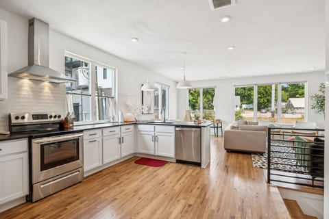 Kitchen: Start your day with coffee and sunshine in this inviting kitchen. A perfect space to gather and create culinary memories.