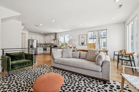 Living Room: Light, airy, and inviting. This living room is the perfect gathering spot for making memories.